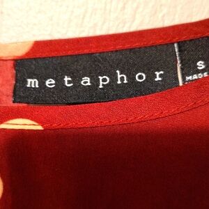 A beautiful pocka dot blouse.